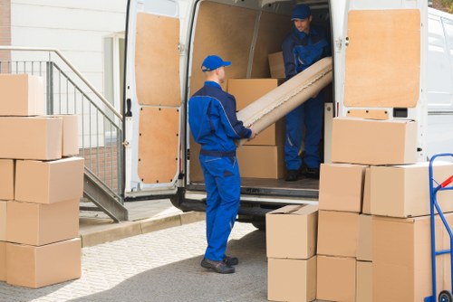 Removal truck loading in a West Hampstead residential street