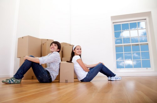 Careful loading of furniture and boxes into a moving van