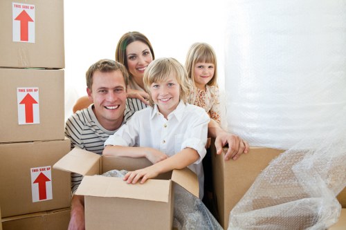 Packed boxes and furniture ready for removal truck hire