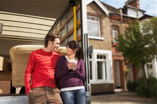 Unpacking service helping a family settle into a new home