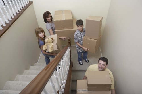 Packed moving boxes ready for a local house relocation in West Hampstead